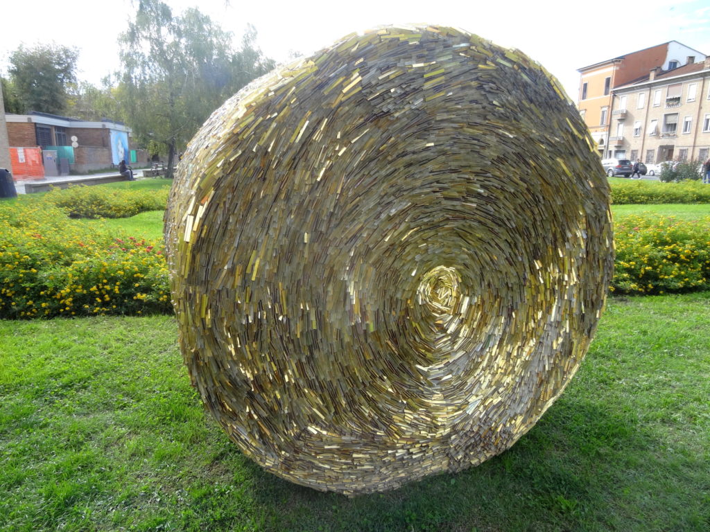 Straw bale mosaics with golden bits
