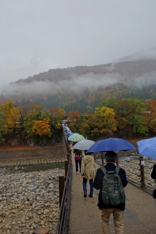 Umbrellas on the bridge