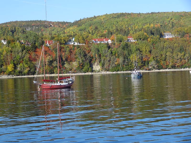 Red boat in Baie-Sainte-Catherine